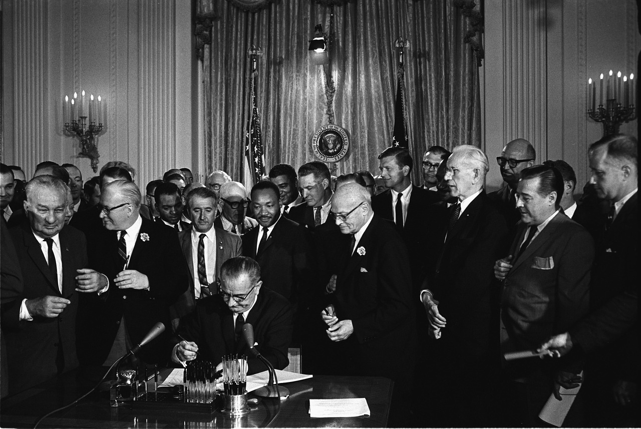Lyndon B. Johnson Signing the Civil Rights Act [No restrictions], via Wikimedia Commons
